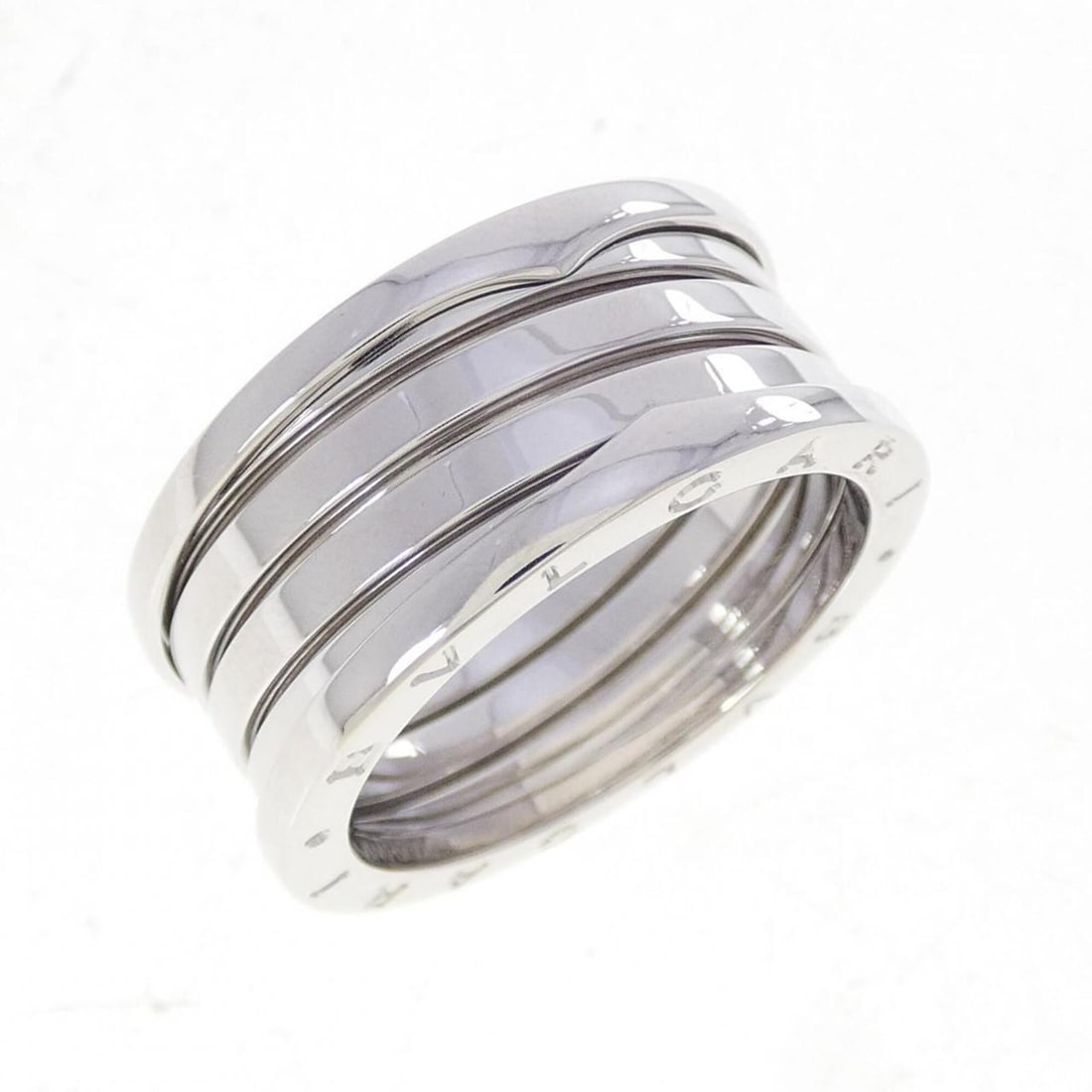Bvlgari B.zero1 4-band ring: --- Catalog ---Category: SizeUS Size: 13Brand Size: 67Category: DesignType: Band ringGender: Men,WomenMaterial: White gold (18K)Category: GeneralBrand: Bvlgari--- Item List ---Section: