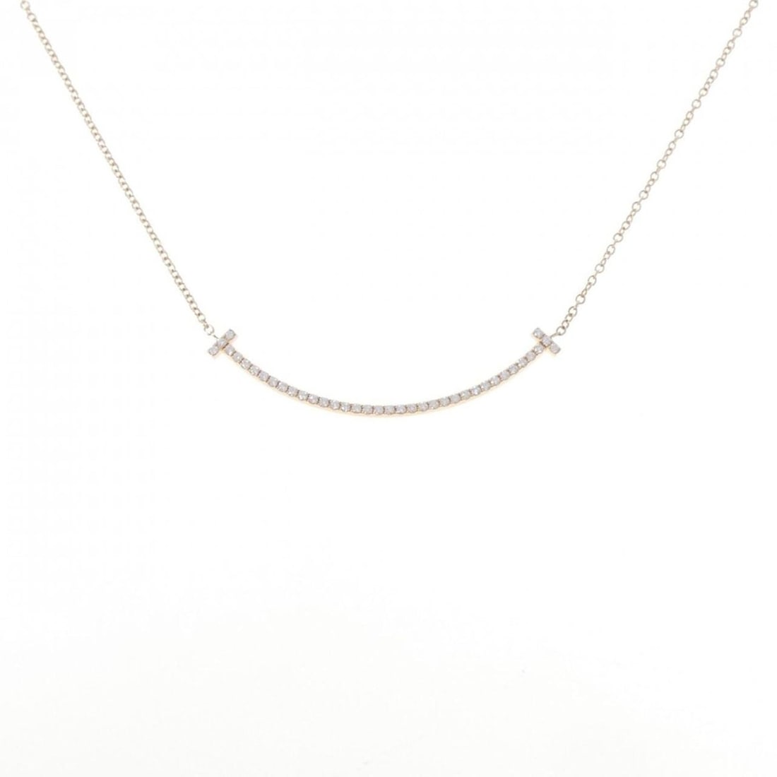 Tiffany T Smile Small Necklace: --- Catalog ---Category: SizePendant Size: 3.6mm x 37mm / 0.14'' x 1.45''Neck Circumference: 40 cm / 15.74''Category: DesignStone: DiamondGender: WomenMaterial: Pink gold (18K)Pendant Type: PendantNec