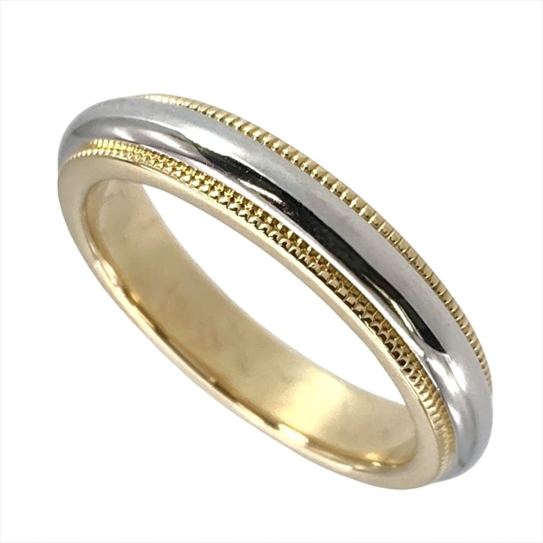 Tiffany & Co. Milgrain Ring, approximately 18K Yellow Gold (5.1g), Platinum 950 (Pt950) combination,: --- Catalog ---Category: SizeJP Size: 6.5US Size: 3.5Category: DesignType: Band ringColor: Platinum, Yellow goldGender: WomenMaterial: Platinum 950, Yellow gold (18K)Category: GeneralBrand: Tiffany---