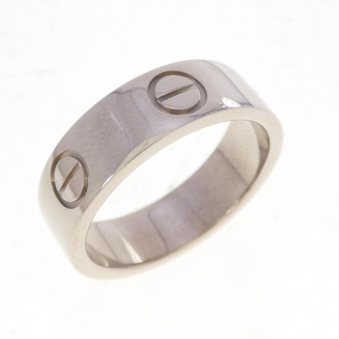 Cartier Love Ring: --- Catalog ---Category: SizeUS Size: 5.5Brand Size: 50Category: DesignType: Band ringColor: White goldGender: WomenMaterial: White gold (18K)Category: GeneralMPN: B4084700Brand: Cartier--- Item List