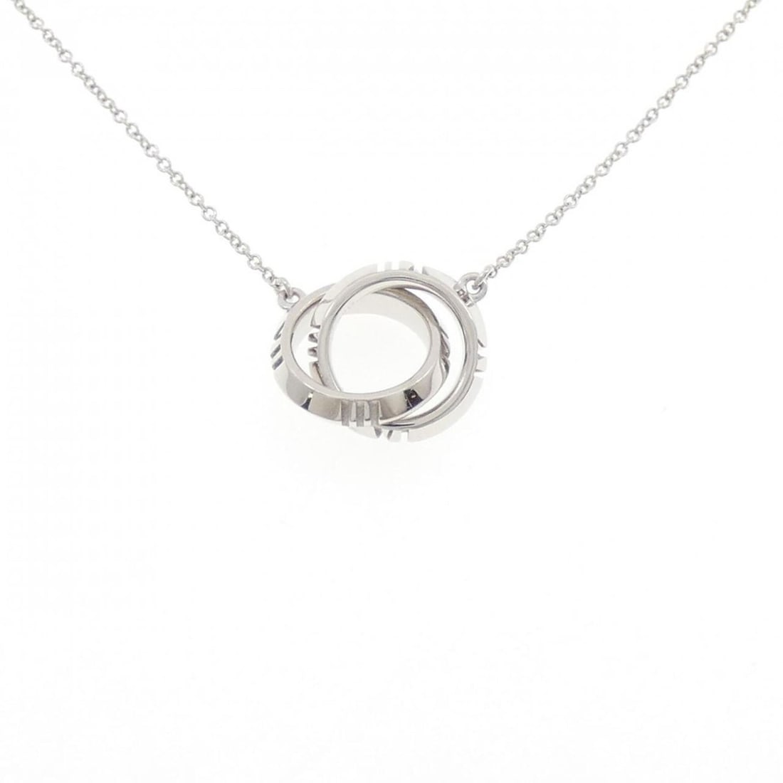 Tiffany & Co. Closed Interlocking Necklace: --- Catalog ---Category: SizePendant Size: 12.6mm x 12.6mm / 0.49'' x 0.49''Neck Circumference: 40 cm - 45 cm / 15.74'' - 17.71''Category: DesignColor: White goldGender: WomenMaterial: White gold (18K