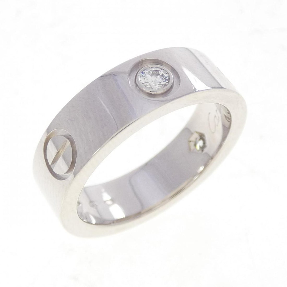 Cartier Love Half-Diamond Ring: --- Catalog ---Category: SizeUS Size: 6Brand Size: 51Category: DesignType: Band ringColor: White goldStone: DiamondGender: WomenMaterial: White gold (18K)Category: GeneralMPN: B4032500Brand: