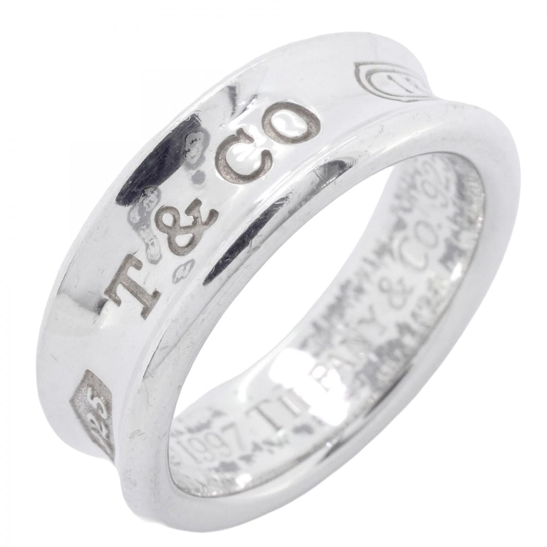 Tiffany & Co. Narrow Ring, Sterling Silver 925, Size 15.5 (Men's/Women's): --- Catalog ---Category: SizeJP Size: 15.5US Size: 7.5Category: DesignType: Band ringGender: Men,WomenMaterial: Silver 925Category: GeneralBrand: Tiffany--- Item List ---Section: ConditionRanking: Ran