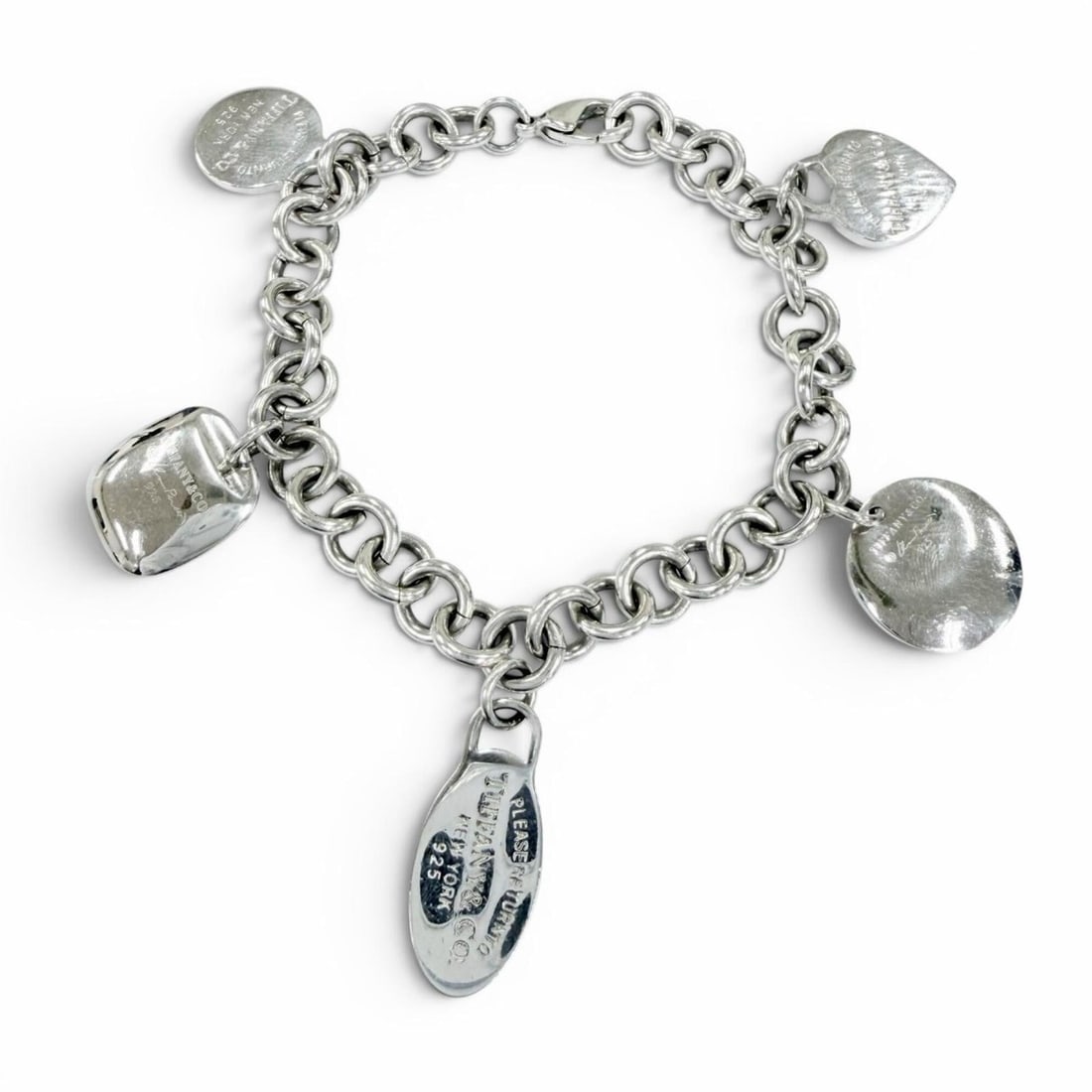 TIFFANY&Co. Tiffany Return to Multi-Tag 925 Bracelet, Rare, Silver, Weight 35.10g, Women's/Men's: --- Catalog ---Category: SizeLength: 19cm / 7.48''Category: DesignType: Charm braceletColor: SilverGender: Men,WomenMaterial: Silver 925Category: GeneralBrand: Tiffany--- Item List ---Section: Conditi
