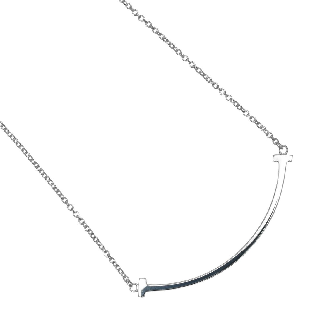Tiffany & Co. T Smile Small Necklace, Sterling Silver 925, Approx. 1.9g: --- Catalog ---Category: SizePendant Size: 9.5mm x 37mm / 0.37'' x 1.45''Neck Circumference: 44 cm / 17.32''Category: DesignGender: WomenMaterial: Silver 925Necklace Type: NecklaceCategory: GeneralBra