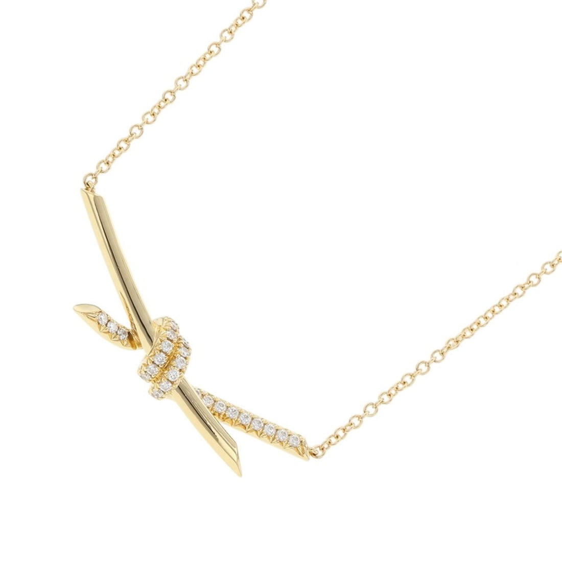 Tiffany & Co. Knot Pendant Necklace with 0.25ct Diamonds, 18K Yellow Gold, Item Number 68887216.: --- Catalog ---Category: SizeWeight: 8g / 0.28oz.Pendant Size: 8.6mm x 38.9mm / 0.33'' x 1.53''Neck Circumference: 38 cm - 43 cm / 14.96'' - 16.92''Category: DesignStone: DiamondGender: WomenMaterial: