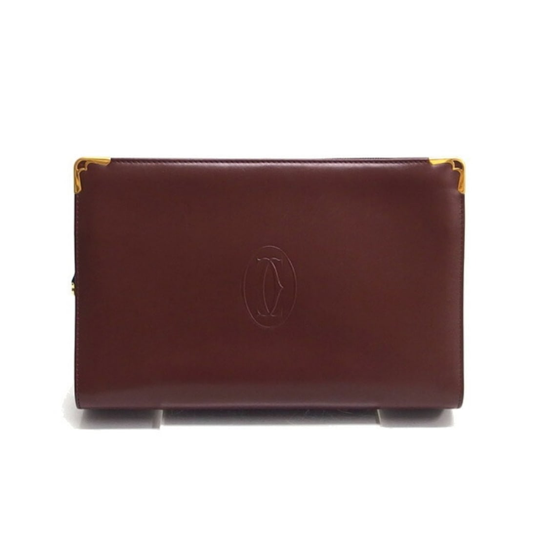 Cartier Must Line Clutch Bag, Second Bordeaux (Deep Red): --- Catalog ---Category: SizeSize (HxWxD): 17cm x 26cm x 6cm / 6.69'' x 10.23'' x 2.36''Category: DesignType: Clutch bag, PouchColor: Bordeaux, Red colorGender: Men,WomenMaterial: Leather Category: Ge