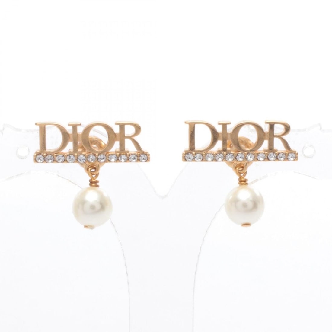 Christian Dior Dior Dio(r)evolution Earrings, Gold Plated (GP), Faux Pearl, Rhinestone, Women's,: --- Catalog ---Category: SizeSize (HxWxD): 17.00mm x 17.00mm / 0.67'' x 0.67''Category: DesignType: Stud earringsColor: GoldStone: Artificial pearl, RhinestoneGender: WomenMaterial: Gold platingStone 