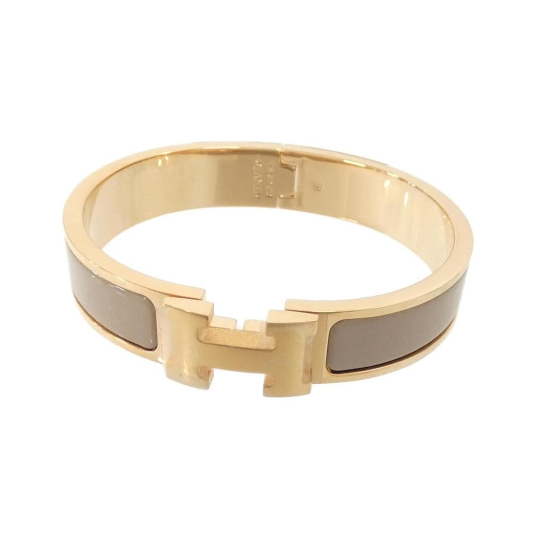 Hermes Click H GM 700001FO Bracelet: --- Catalog ---Category: DesignType: Charm braceletColor: MarronGender: WomenCategory: GeneralLine: ClicBrand: Hermes--- Item List ---Section: ConditionRanking: Rank A Used - A few traces of usage, so