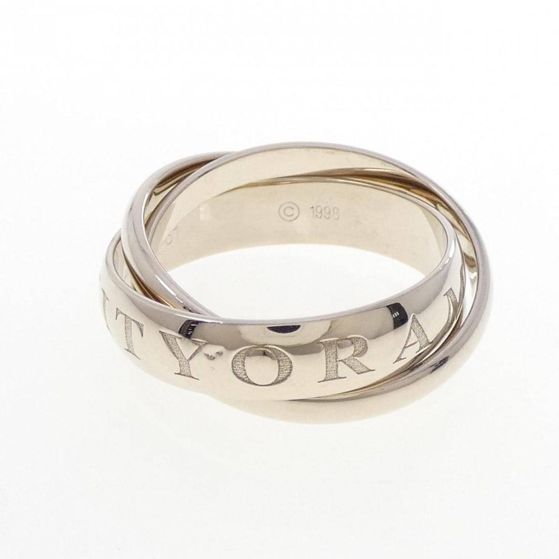 Cartier Trinity 1998 Christmas Limited Edition Ring: --- Catalog ---Category: SizeJP Size: 21US Size: 10Category: DesignType: Band ringGender: Men,WomenMaterial: White gold (18K)Category: GeneralLine: TrinityBrand: Cartier--- Item List ---Section: