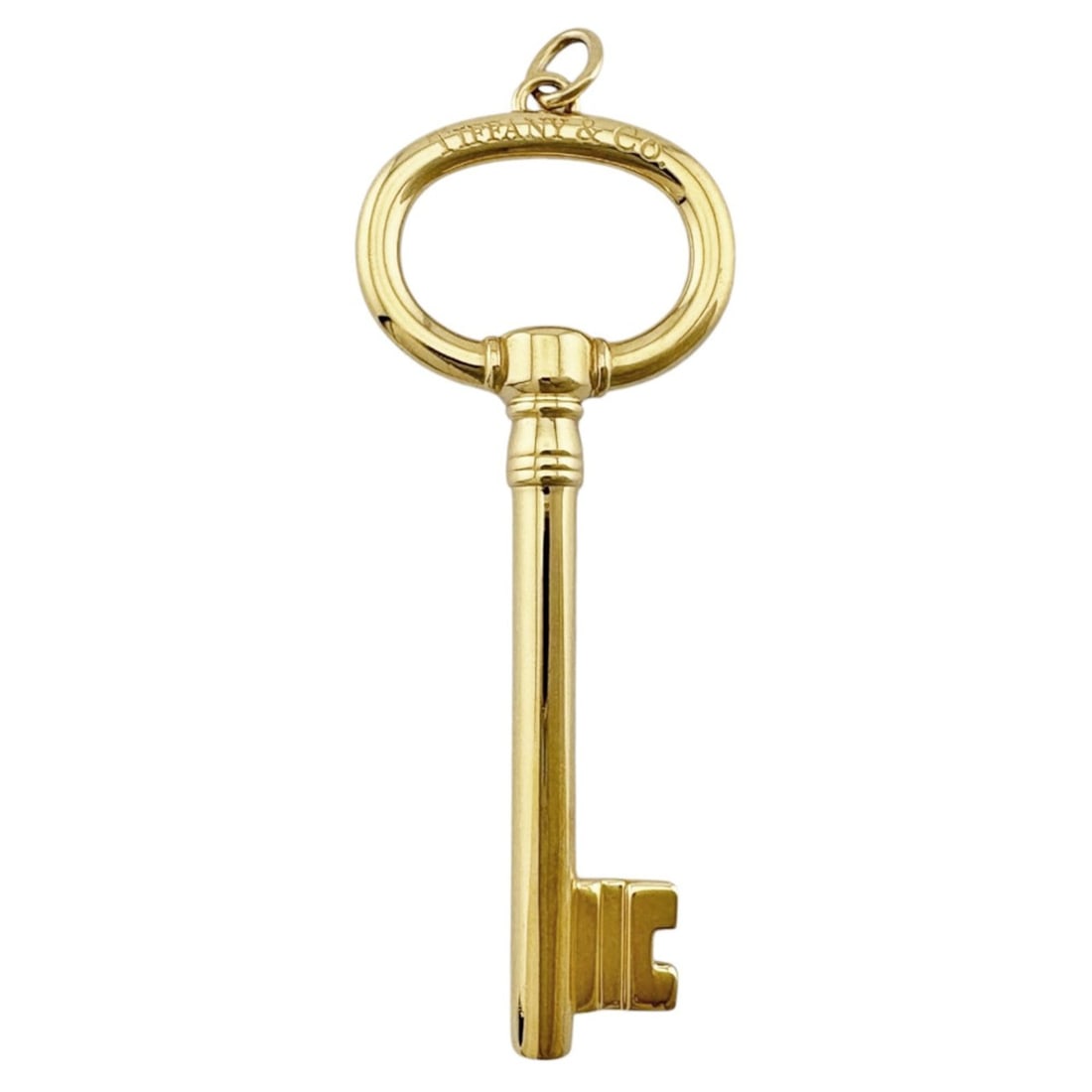 Tiffany & Co. Oval Key Pendant Top, 18K Yellow Gold, Women's.: --- Catalog ---Category: SizePendant Size: 67mm x 24.5mm / 2.63'' x 0.96''Category: DesignColor: GoldGender: WomenMaterial: Yellow gold (18K)Necklace Type: PendantCategory: GeneralBrand: Tiffany--- It