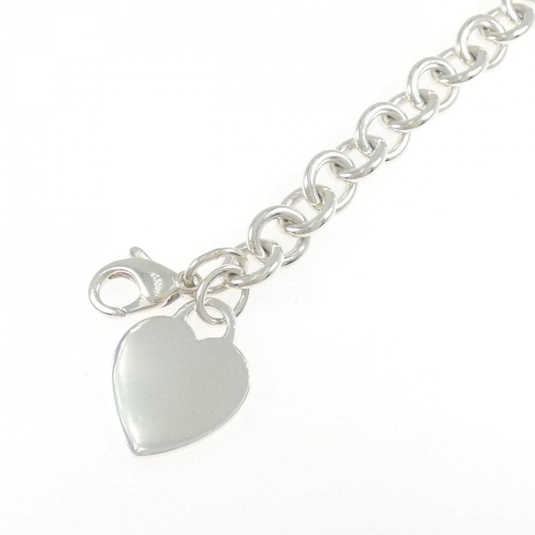 Tiffany Heart Tag Bracelet: --- Catalog ---Category: SizeLength: 19.5cm / 7.67''Category: DesignType: Charm braceletGender: WomenMaterial: Silver 925Category: GeneralBrand: Tiffany--- Item List ---Section: ConditionRanking: Rank