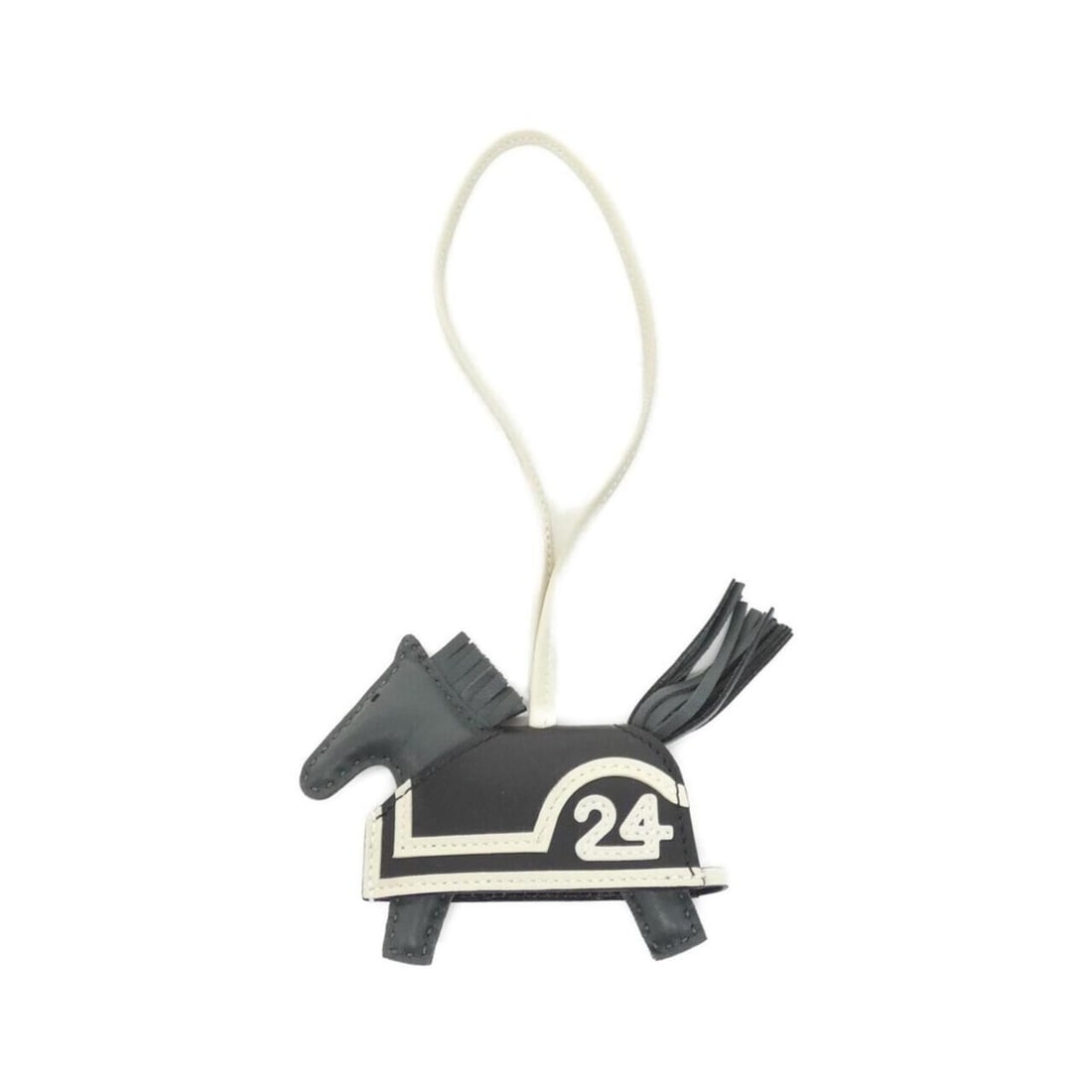 Hermes Rodeo Robeo 24 PM 087349CA Accessory Bag Charm: --- Catalog ---Category: SizeStone Size (HxW): 85.00mm x 75.00mm / 3.35'' x 2.95''Category: DesignType: Handbag charmColor: BlackGender: Women,MenMaterial: Agneau MiloCategory: GeneralMPN:
