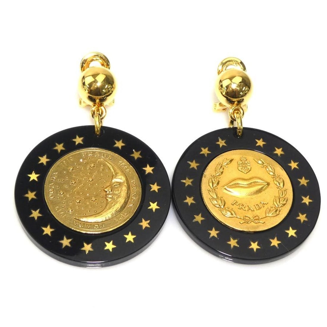 Prada earrings, metal and plastic, black gold, women's, r11196k: --- Catalog ---Category: DesignType: Clip earringsColor: Black, GoldGender: WomenMaterial: Metal, PlasticCategory: GeneralBrand: Prada--- Item List ---Section: ConditionRanking: Rank AB Used - Traces 