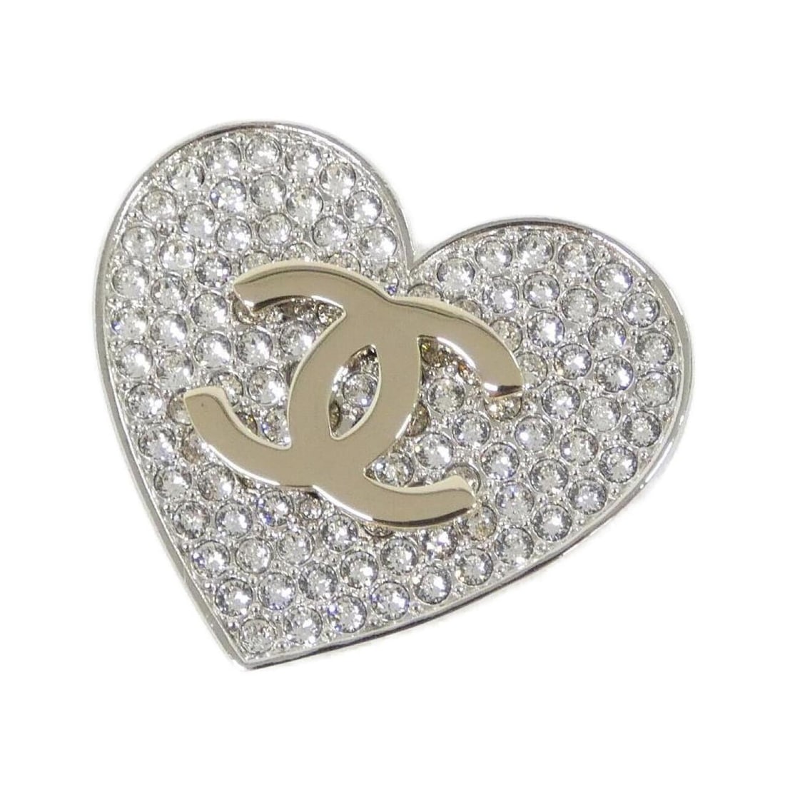 Chanel ABH093 Brooch: --- Catalog ---Category: SizeSize (HxWxD): 3.1cm x 3.5cm / 1.22'' x 1.37''Category: DesignType: BroochColor: Gold, SilverStone: CrystalGender: WomenCategory: GeneralBrand: ChanelModel: ABH093--- Item