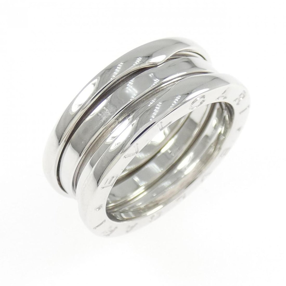 Bvlgari B.zero1 3-band ring: --- Catalog ---Category: SizeWidth: 7.8mm / 0.31''Weight: 8.2g / 0.28oz.JP Size: 12.5US Size: 6.5Brand Size: 53Category: DesignType: Band ringMetal: White GoldGender: WomenMetal Purity: 18KCategory: