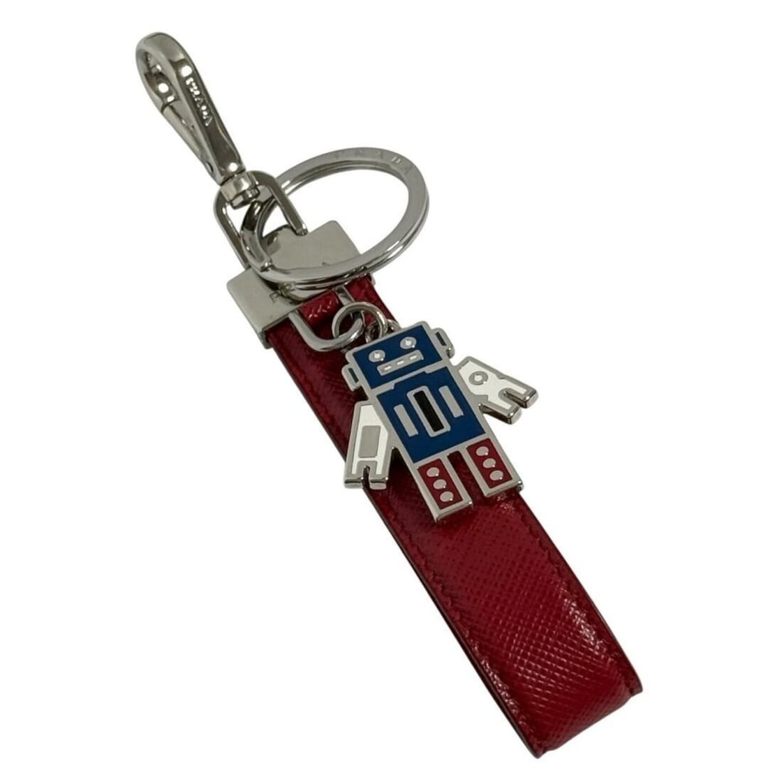 Prada Men's Saffiano Leather Keychain Keyring Robot Red: --- Catalog ---Category: DesignType: KeyringColor: Red colorGender: MenMaterial: Leather, MetalCategory: GeneralBrand: PradaCountry of Origin: Italy--- Item List ---Section: ConditionRanking: Rank A U
