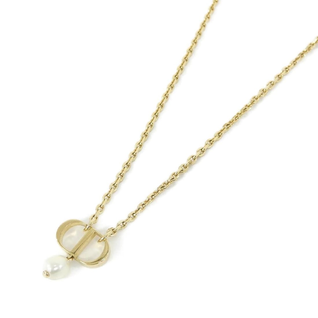 Christian Dior Petite CD N1390PTCRS Necklace: --- Catalog ---Category: SizePendant Size: 14mm x 17mm / 0.55'' x 0.66''Neck Circumference: 43 cm / 16.92''Category: DesignColor: Gold, WhiteGender: WomenNecklace Type: NecklaceCategory: GeneralMPN: