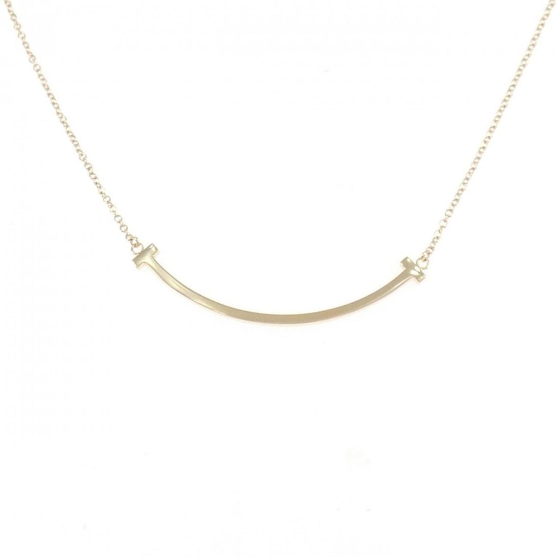 Tiffany T Smile Small Necklace: --- Catalog ---Category: SizePendant Size: 3.6mm x 37.5mm / 0.14'' x 1.47''Neck Circumference: 41 cm - 46 cm / 16.14'' - 18.11''Category: DesignGender: WomenMaterial: Pink gold (18K)Pendant Type: