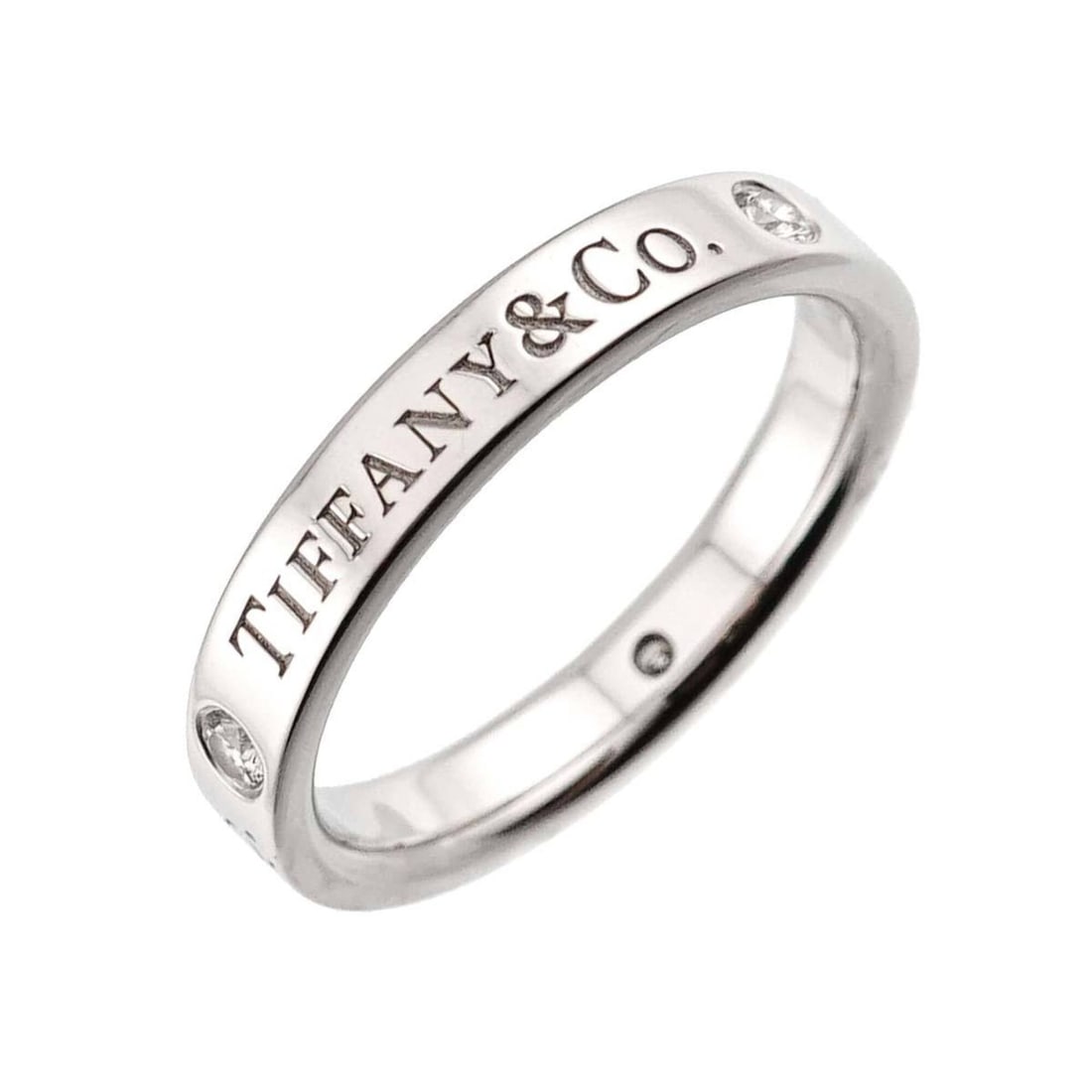 Tiffany & Co. T&CO Flat Band Ring with 3 Diamonds, Platinum (Pt): --- Catalog ---Category: SizeJP Size: 7.5US Size: 4Category: DesignType: Band ringColor: PlatinumGender: WomenMaterial: Platinum 950Category: GeneralBrand: Tiffany--- Item List ---Section: ConditionRa
