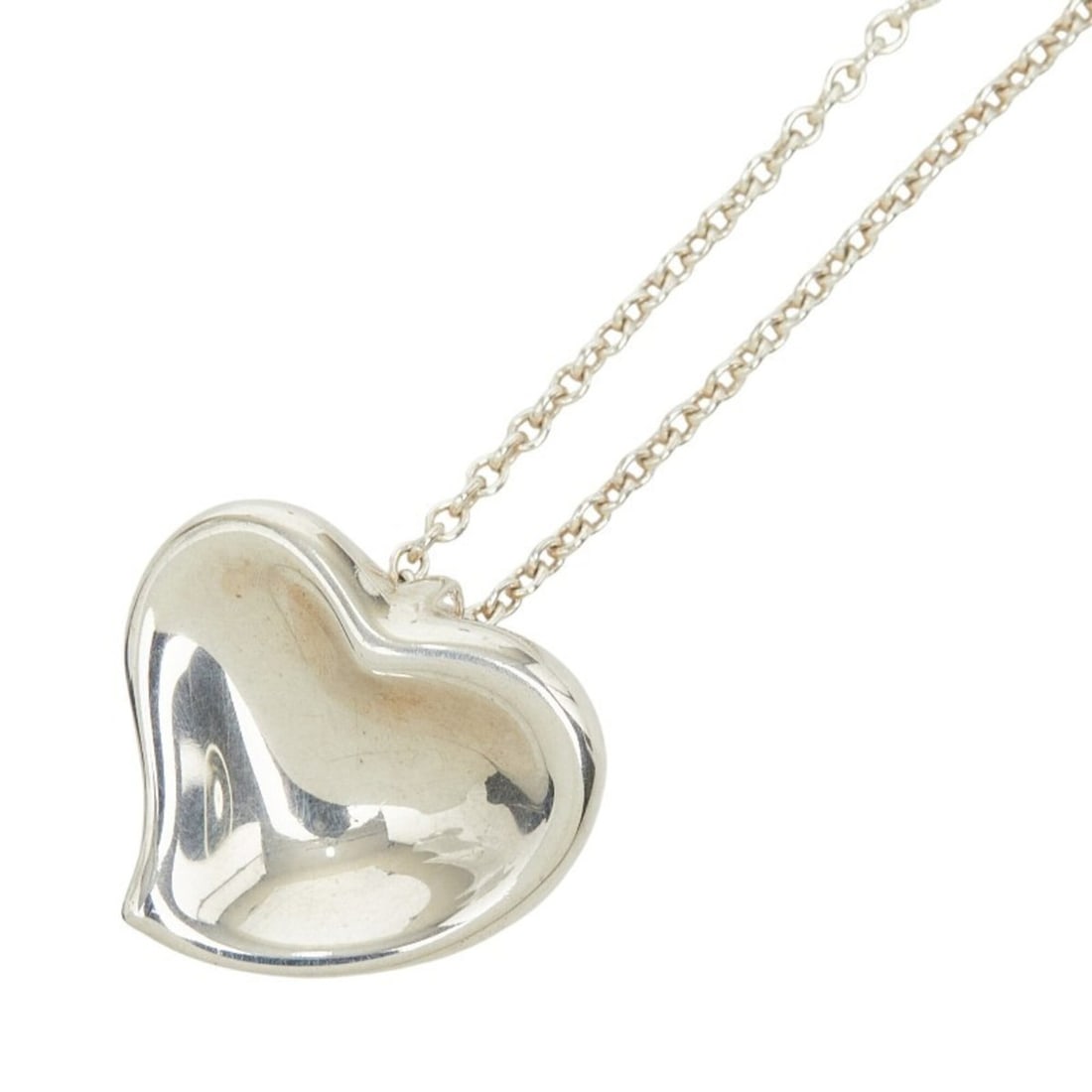 Tiffany & Co. Curved Heart Necklace, SV925 Silver, Women's.: --- Catalog ---Category: SizePendant Size: 13.2mm x 14.1mm / 0.51'' x 0.55''Neck Circumference: 42 cm / 16.53''Category: DesignColor: SilverGender: WomenMaterial: Silver 925Necklace Type: NecklaceCate