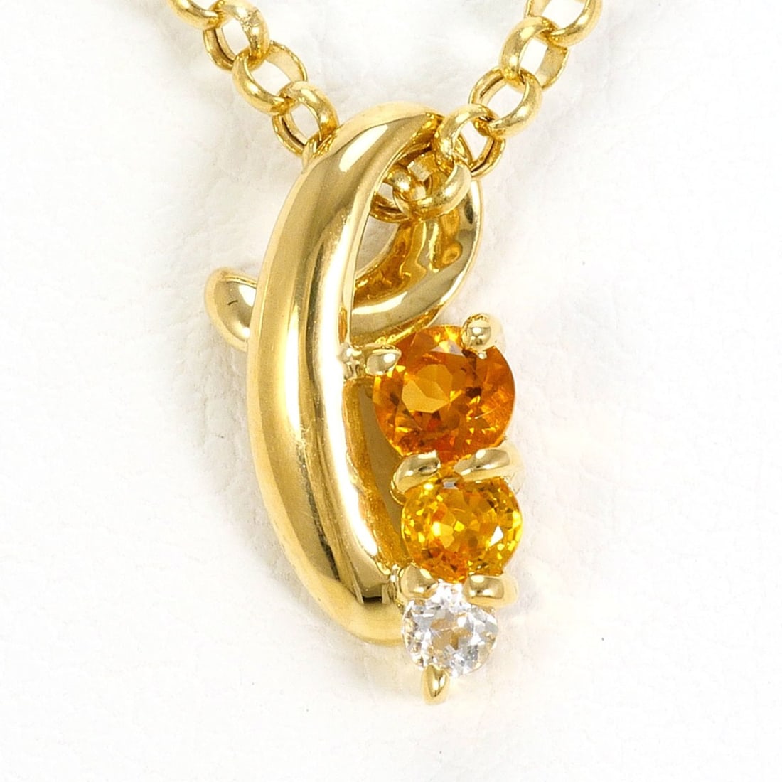 18K (18-karat) Yellow Gold Necklace with Citrine and White Sapphire, Total Weight 2.2g, 40cm,: --- Catalog ---Category: SizeWeight: 2.2g / 0.07oz.Pendant Size: 13mm x 7mm / 0.51'' x 0.27''Neck Circumference: 40 cm / 15.74''Category: DesignColor: White, Yellow goldMetal: GoldStone: Citrine, Sapp