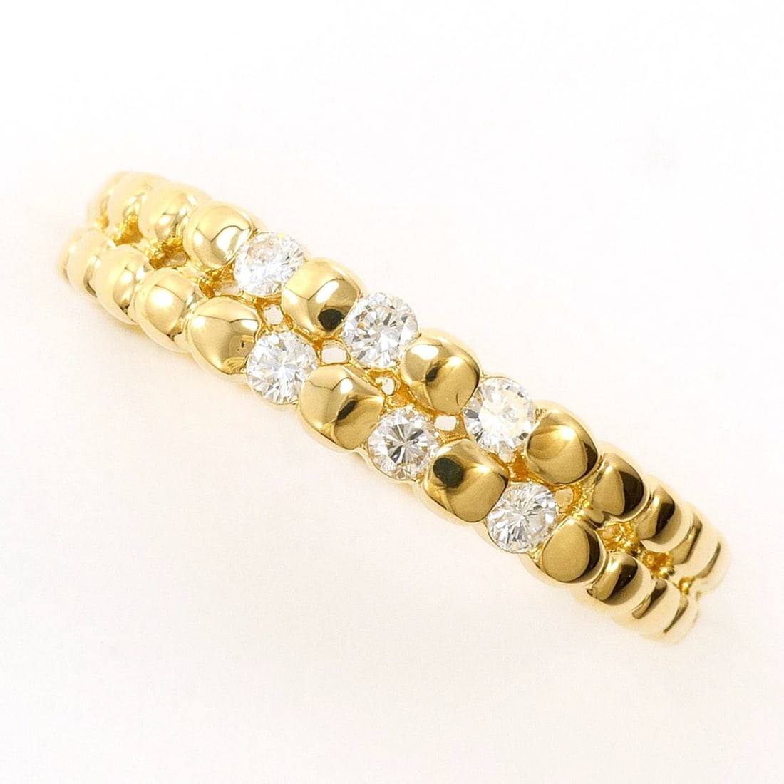 18K (18-karat) Yellow Gold Ring with 0.12 ct Diamond, Total Weight 1.8g, Jewelry: --- Catalog ---Category: SizeWidth: 4mm / 0.16''Weight: 1.8g / 0.06oz.JP Size: 10US Size: 5.5Category: DesignType: Band ringColor: Yellow goldMetal: GoldStone: DiamondGender: WomenMaterial: Yellow gol