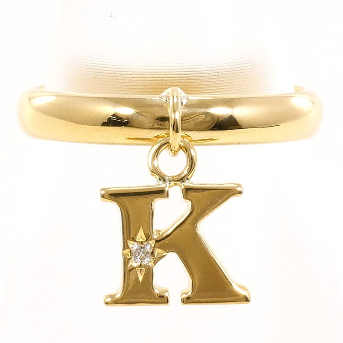 18K (18-karat) yellow gold ring with diamond (carat weight not stamped), total 2.1g, jewelry.: --- Catalog ---Category: SizeWidth: 11mm / 0.43''Weight: 2.1g / 0.07oz.JP Size: 5US Size: 3.5Category: DesignType: Band ringColor: Yellow goldMetal: GoldStone: DiamondGender: WomenMaterial: Yellow gol