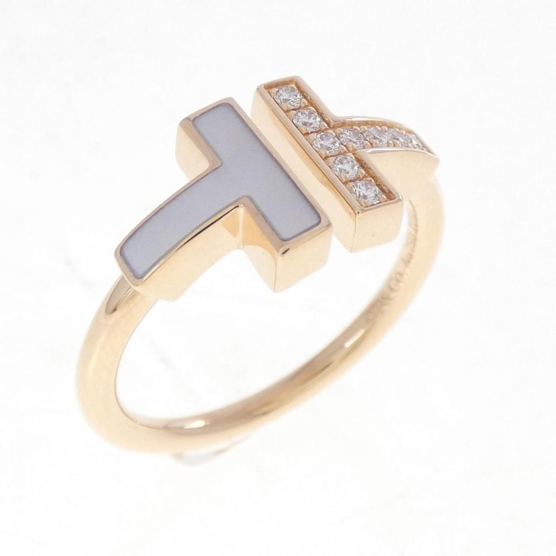 Tiffany T Wire Ring: --- Catalog ---Category: PackNumber in Pack: 1Category: SizeWidth: 8.8mm / 0.35''Weight: 4.1g / 0.14oz.JP Size: 12US Size: 6.5Category: DesignType: Band ringColor: Pink goldMetal: GoldStone: Diamond,