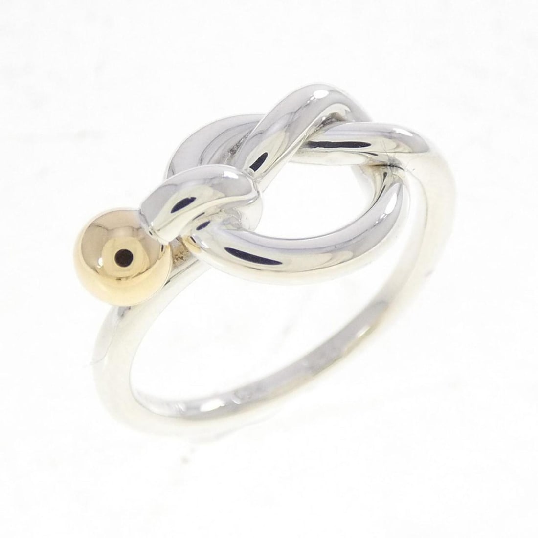 Tiffany Love Knot Ring: --- Catalog ---Category: PackNumber in Pack: 1Category: SizeWidth: 9.2mm / 0.36''Weight: 2.7g / 0.09oz.JP Size: 9US Size: 5Category: DesignType: Band ringMetal: Gold, SilverMaterial: Silver 925,