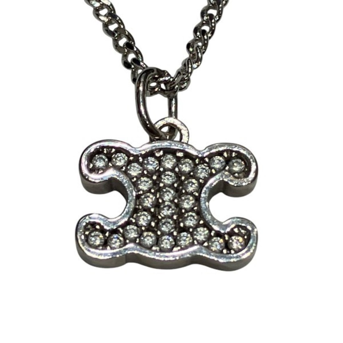 Celine Triomphe Necklace with Rhinestones - Women's Brand Accessory: --- Catalog ---Category: SizePendant Size: 8mm x 11mm / 0.31'' x 0.43''Neck Circumference: 42 cm / 16.53''Category: DesignColor: SilverGender: WomenMaterial: MetalNecklace Type: NecklaceCategory: Gene