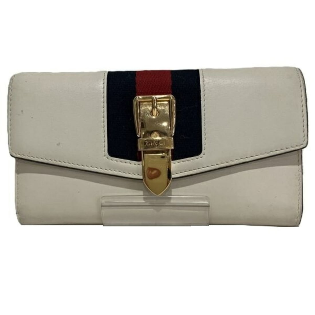 Gucci Sylvie Continental Long Wallet (476084) - Women's: --- Catalog ---Category: SizeSize (HxWxD): 11cm x 19cm x 2cm / 4.33'' x 7.48'' x 0.78''Category: DesignType: Long wallet (bi-fold)Color: IvoryGender: WomenMaterial: Canvas , Leather Category: GeneralB