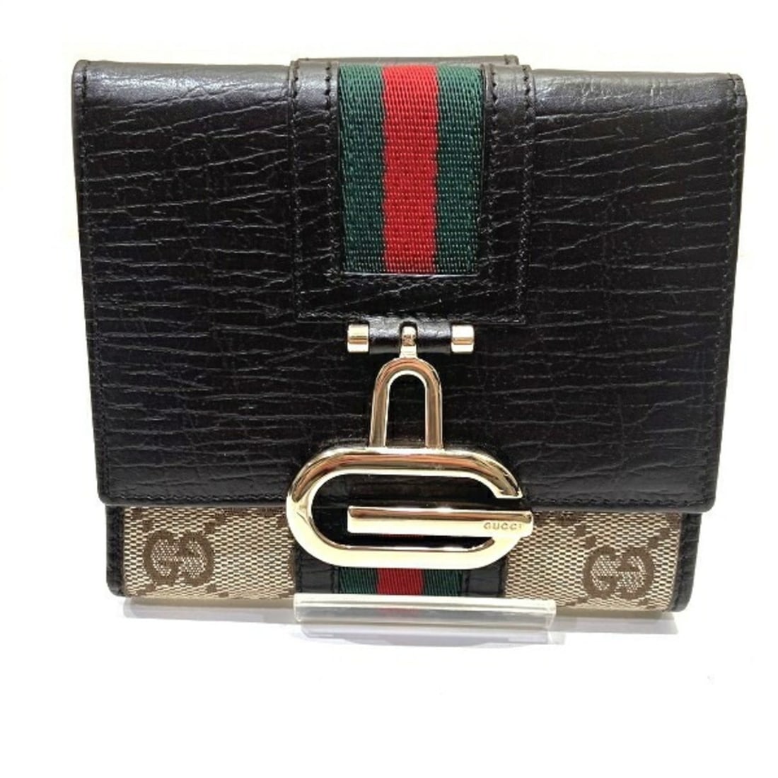 Gucci GUCCI Sherry 131848 Double Snap Tri-fold Wallet for Women: --- Catalog ---Category: SizeSize (HxWxD): 12cm x 10.5cm x 2cm / 4.72'' x 4.13'' x 0.78''Category: DesignType: Wallet (tri-fold)Color: BrownGender: WomenMaterial: Leather , Canvas Category: GeneralBra