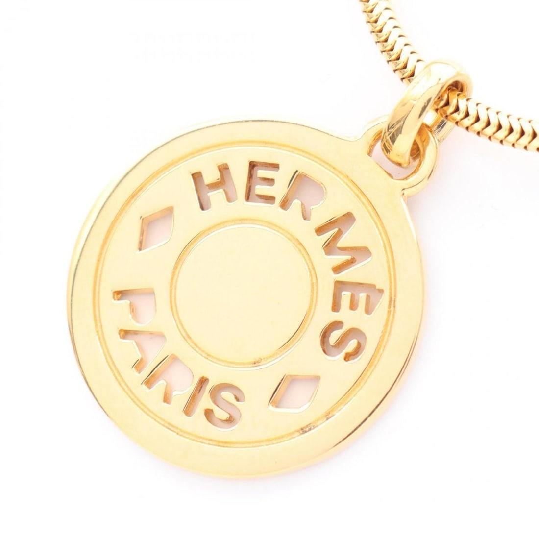Hermes Bijou Terry Fantasière Sellier Necklace, Gold Plated (GP), Women's, Tone: --- Catalog ---Category: SizePendant Size: 38mm x 28mm / 1.49'' x 1.1''Neck Circumference: 59 cm / 23.22''Category: DesignColor: GoldGender: WomenMaterial: Gold platingNecklace Type: NecklaceCategory:
