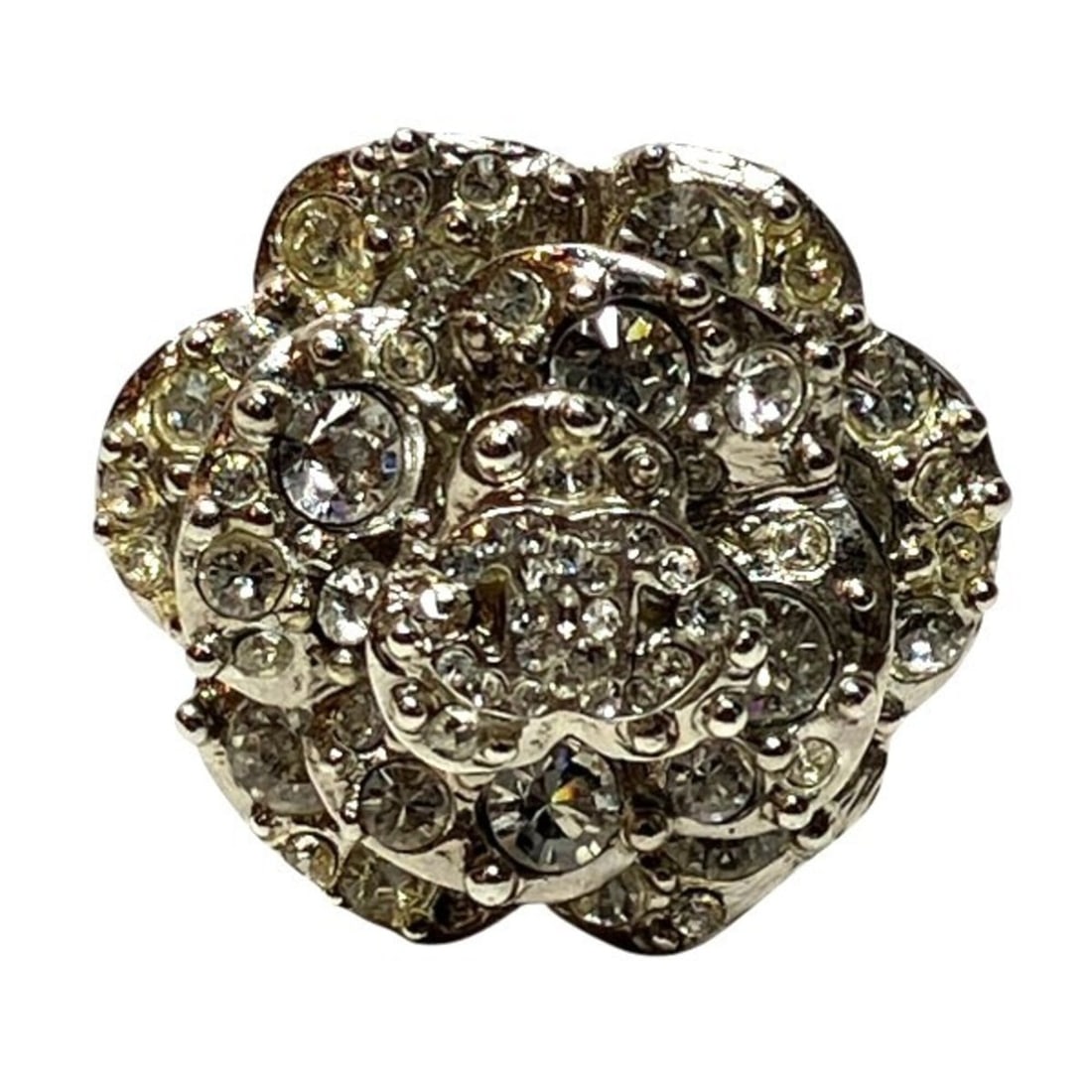 Chanel Camellia B13P Light Stone Ring - Women's Accessory: --- Catalog ---Category: SizeJP Size: 13US Size: 6.5Category: DesignType: Band ringColor: SilverStone: RhinestoneGender: WomenMaterial: MetalCategory: GeneralBrand: Chanel--- Item List ---Section: Con