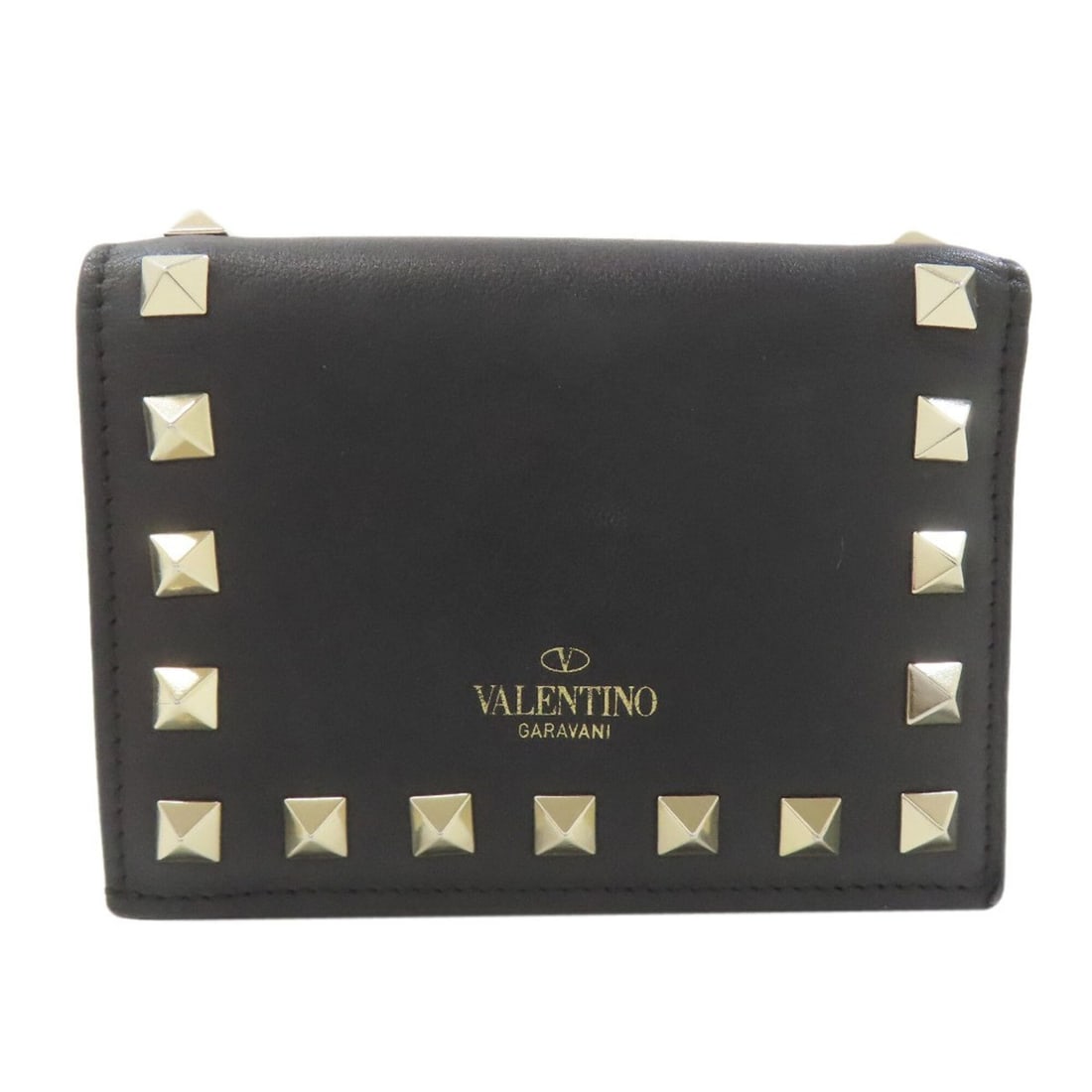 Valentino Rockstud Bi-fold Leather Wallet for Women: --- Catalog ---Category: SizeSize (HxWxD): 8.5cm x 11cm x 1.5cm / 3.34'' x 4.33'' x 0.59''Category: DesignType: Wallet (bi-fold)Color: BlackGender: WomenMaterial: Leather Category: GeneralBrand: Valen