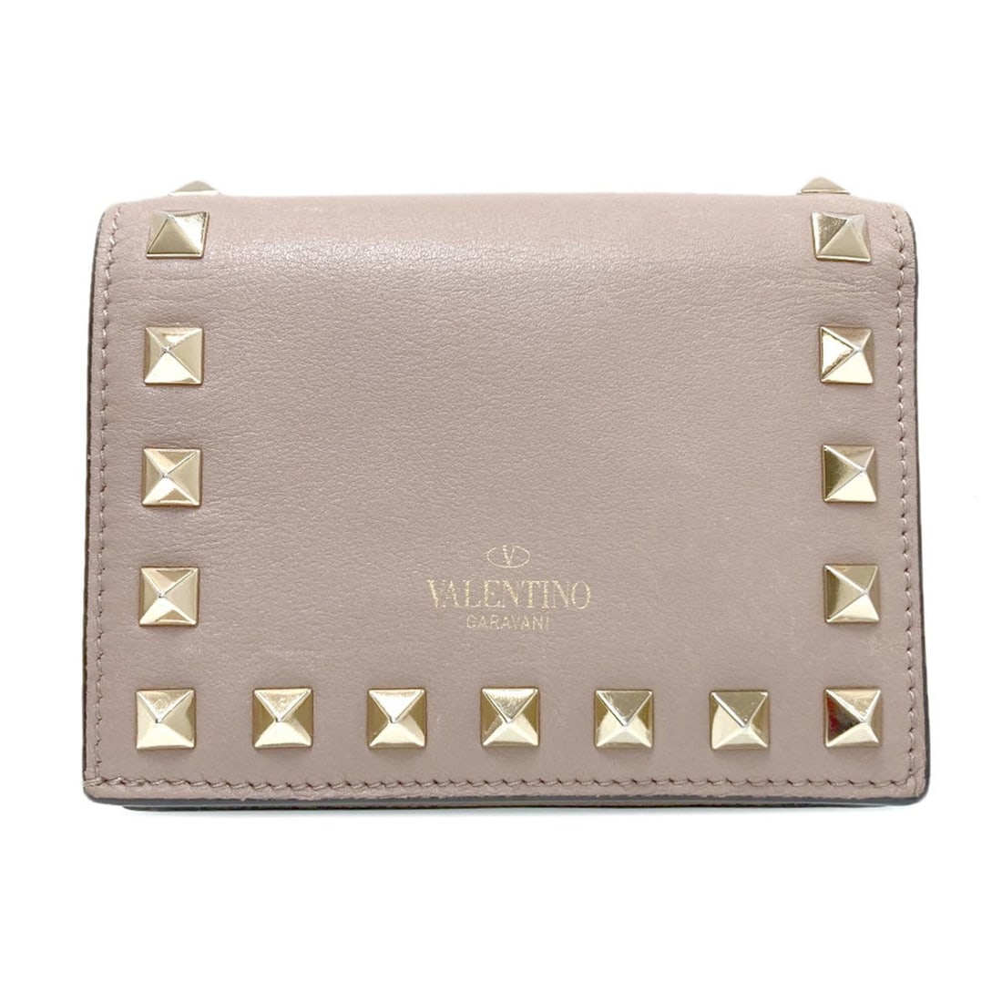Valentino Rockstud Bi-fold Leather Wallet for Women: --- Catalog ---Category: SizeSize (HxWxD): 8.5cm x 11.5cm x 2cm / 3.34'' x 4.52'' x 0.78''Category: DesignType: Wallet (bi-fold)Color: BeigeGender: WomenMaterial: Leather Category: GeneralBrand: Valen