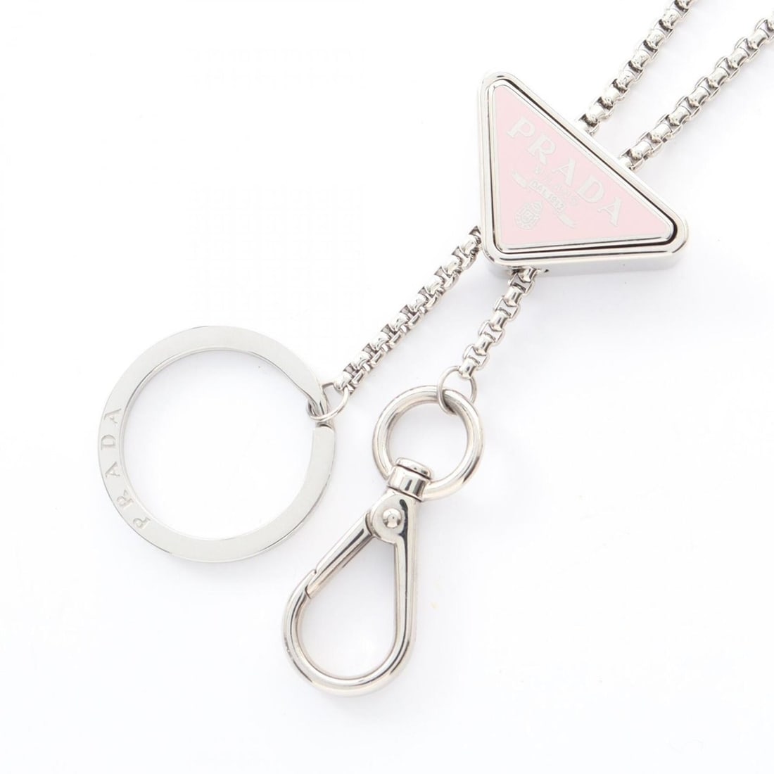 Prada Keychain Necklace Jewelry, Stainless Steel, Women's, Silver Tone: --- Catalog ---Category: SizePendant Size: 20mm x 35mm / 0.78'' x 1.37''Neck Circumference: 97 cm / 38.18''Category: DesignColor: SilverGender: WomenMaterial: Stainless steelNecklace Type: NecklaceCat
