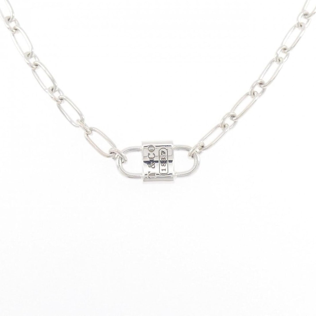 Tiffany & Co. 1837 Small Double Lock Necklace: --- Catalog ---Category: SizePendant Size: 9.4mm x 18.1mm / 0.37'' x 0.71''Neck Circumference: 47 cm / 18.5''Category: DesignColor: SilverGender: WomenMaterial: Silver 925Pendant Type: PendantNecklace