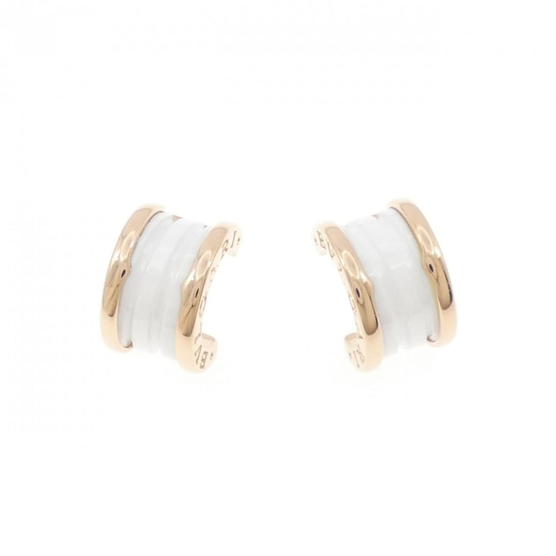 Bvlgari B.zero1 Earrings: --- Catalog ---Category: SizeSize (HxWxD): 14.60mm x 9.20mm / 0.57'' x 0.36''Category: DesignType: Stud earringsGender: WomenMaterial: Ceramic, Pink gold (18K)Category: GeneralMPN: 346464Brand: Bvlgar