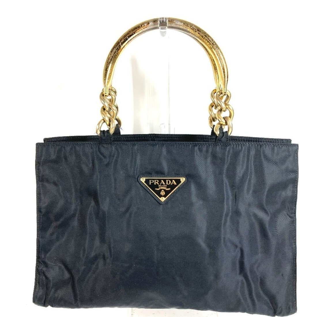 PRADA Triangle Logo Plate Metal Handle Bag Tote Handbag Nylon Men's Women's Black: --- Catalog ---Category: SizeSize (HxWxD): 22.5cm x 35cm x 12cm / 8.85'' x 13.77'' x 4.72''Category: DesignType: Handbag, Tote bagColor: BlackGender: Men,WomenMaterial: Nylon Category: GeneralBrand: