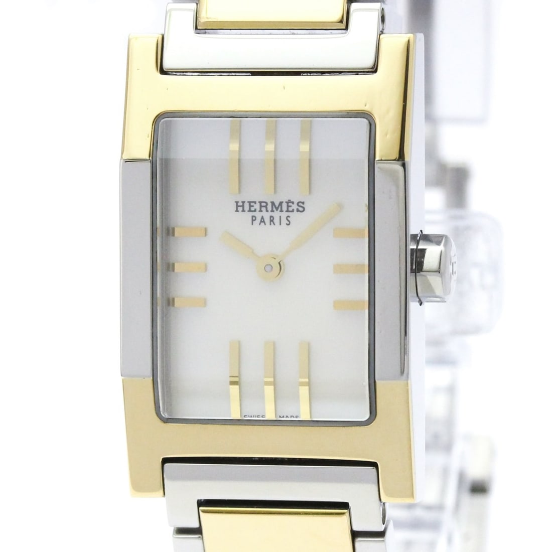 HERMES Tandem MOP Dial Gold Plated Steel Quartz Watch TA1.220 Polished: --- Catalog ---Category: SizeCase Diameter: 19mm / 0.75''Category: DesignType: WristwatchStyle: Dress/FormalGender: WomenColor (Dial): White shellMaterial (Band): Gold plated, Stainless steelMaterial 