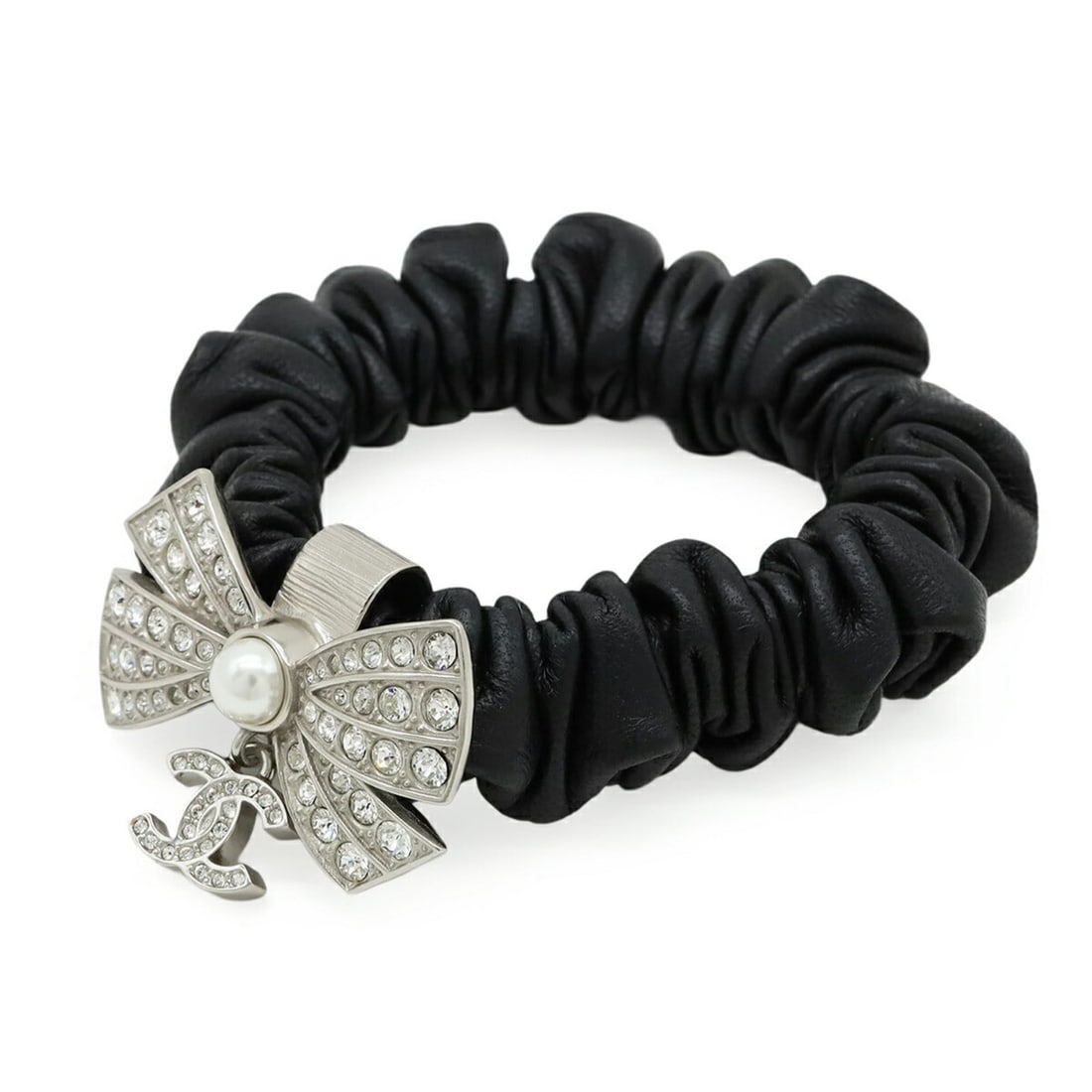 CHANEL Coco Mark Ribbon Rhinestone Leather Scrunchie Hair Tie with Faux Pearl, Black (A22P): --- Catalog ---Category: SizeSize (LxW): 2.29cm x 3.8cm / 0.9'' x 1.49''Category: DesignType: ScrunchieColor: Black, SilverGender: WomenMaterial: Artificial pearl, Leather, RhinestoneCategory: General