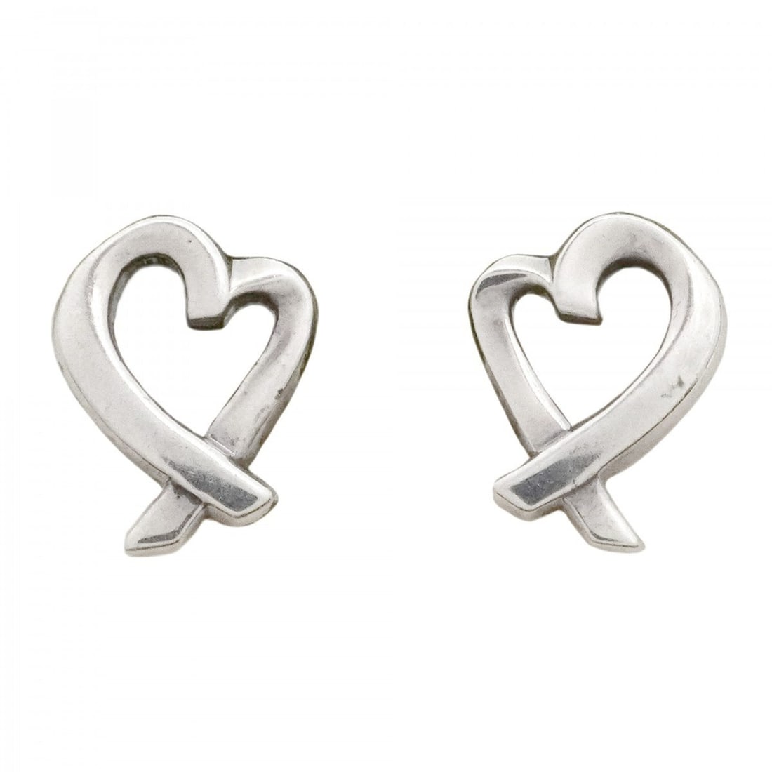 Tiffany & Co. Loving Heart Sterling Silver Earrings for Women: --- Catalog ---Category: SizeSize (HxWxD): 10.10mm x 8.20mm / 0.40'' x 0.32''Category: DesignType: Stud earringsGender: WomenMaterial: Silver 925Category: GeneralBrand: Tiffany--- Item List ---Section