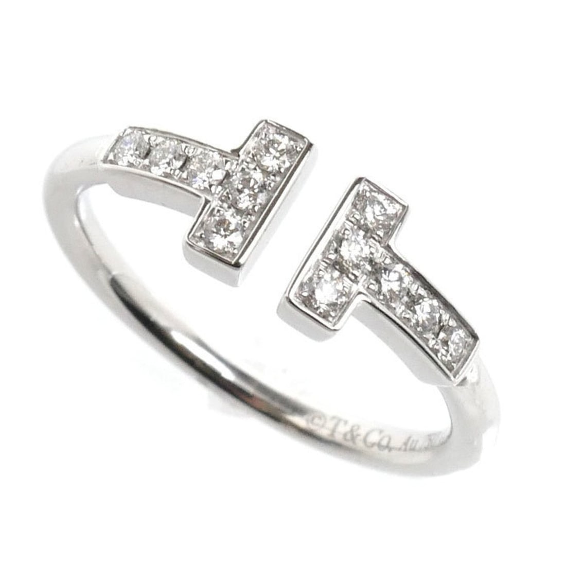 TIFFANY&Co. Tiffany & Co. 18KWG White Gold T Wire Ring (60147237) with Diamonds, 2.3g, Women's.: --- Catalog ---Category: SizeUS Size: 4.5Brand Size: 48Category: DesignType: Band ringStone: DiamondGender: WomenMaterial: White gold (18K)Category: GeneralMPN: 60147237Brand: TiffanyCountry of Origin