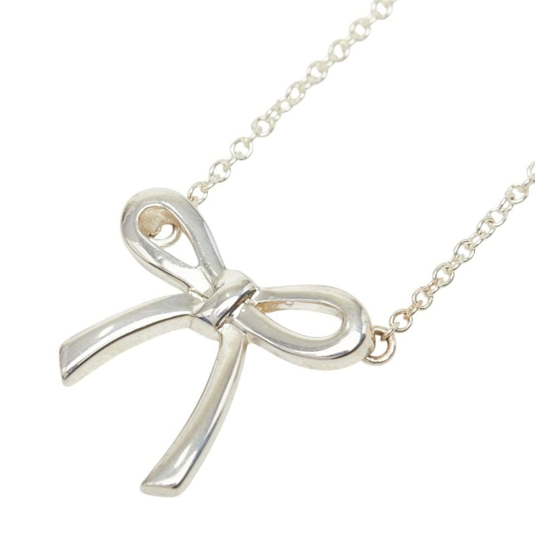 Tiffany & Co. Bow Ribbon Necklace, SV925 Silver, Women's.: --- Catalog ---Category: SizePendant Size: 14.5mm x 14.9mm / 0.57'' x 0.58''Neck Circumference: 41 cm / 16.14''Category: DesignGender: WomenMaterial: Silver 925Necklace Type: NecklaceCategory: General