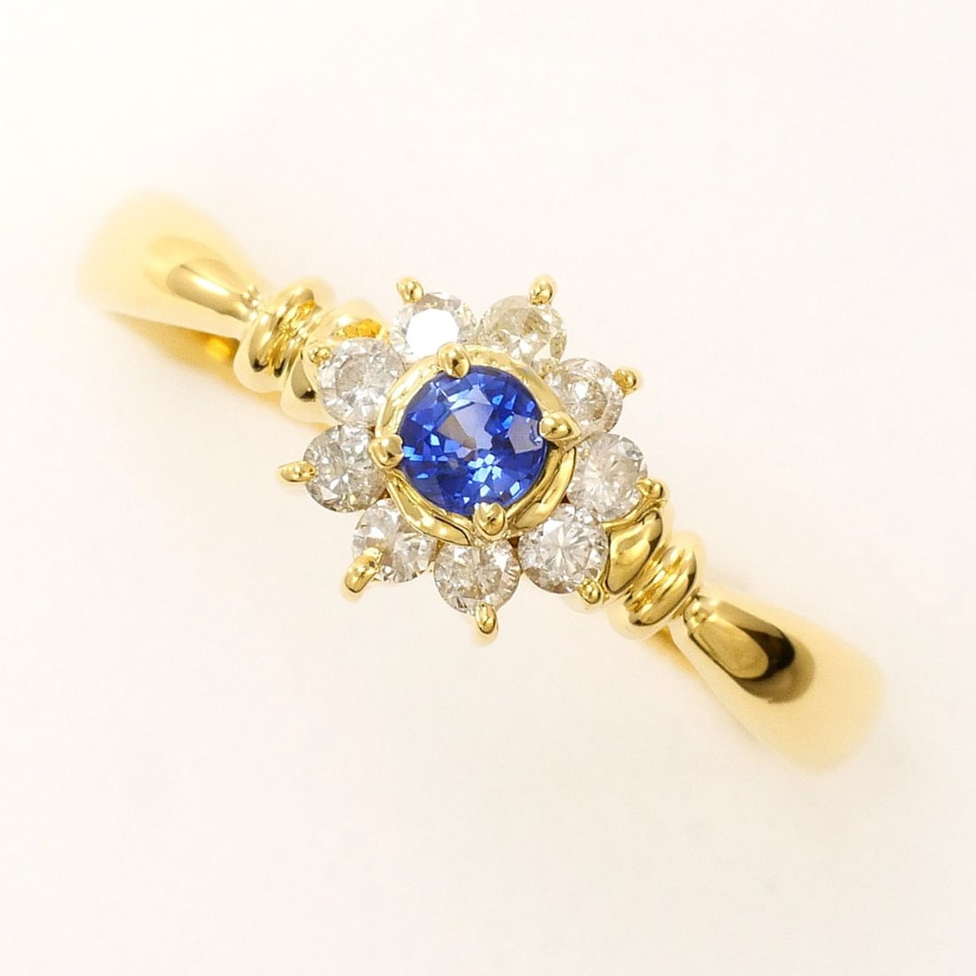 18K (18-karat) Yellow Gold Ring with Sapphire and Diamond (0.19ct), Total Weight 2.1g, Jewelry: --- Catalog ---Category: SizeWidth: 7mm / 0.28''Weight: 2.1g / 0.07oz.JP Size: 12US Size: 6.5Category: DesignType: Band ringColor: Yellow goldMetal: GoldStone: Diamond, SapphireGender: WomenMaterial: 