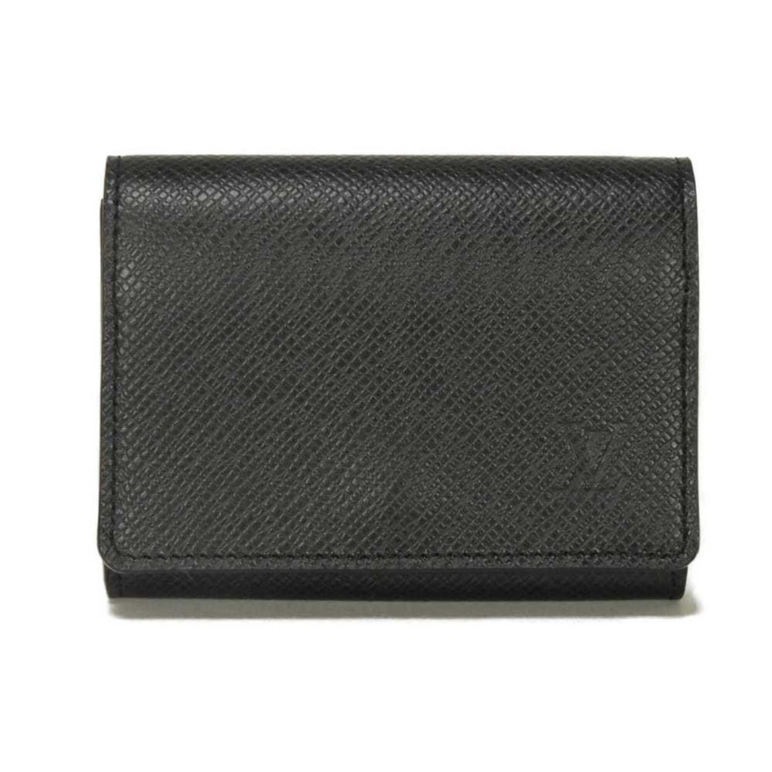Louis Vuitton Enveloppe Carte de Visite NM Embossed Black Card Case, Taiga Noir M64595, Men's: --- Catalog ---Category: DesignType: Card caseColor: Black, NoirGender: MenMaterial: Taiga leather , Leather Category: GeneralBrand: Louis VuittonCategory: Physical PropertiesSize (HxWxD): 7.8cm x 10.