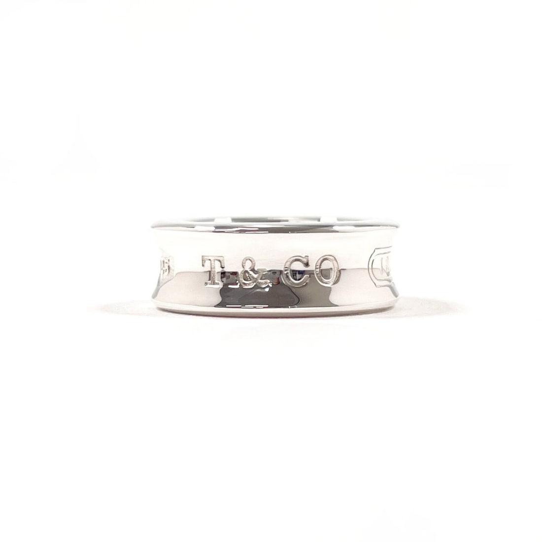 TIFFANY&Co. Tiffany 1837 Medium Ring, Sterling Silver 925, Size 7.5cm, Women's: --- Catalog ---Category: SizeJP Size: 7.5US Size: 4Category: DesignType: Band ringColor: SilverGender: WomenMaterial: Silver 925Category: GeneralBrand: Tiffany--- Item List ---Section: ConditionRankin