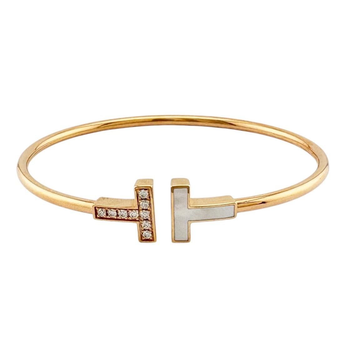 Tiffany & Co. T Wire Bangle, 18K Pink Gold, 0.11ct Diamond, Mother-of-Pearl, Women's.: --- Catalog ---Category: DesignType: BangleColor: Pink goldGender: WomenMaterial: Pink gold (18K)Category: GeneralBrand: Tiffany--- Item List ---Section: ConditionRanking: Rank A Used - A few traces o